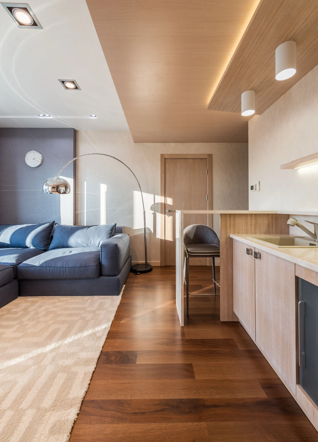 Apartment lounge with a blue sofa